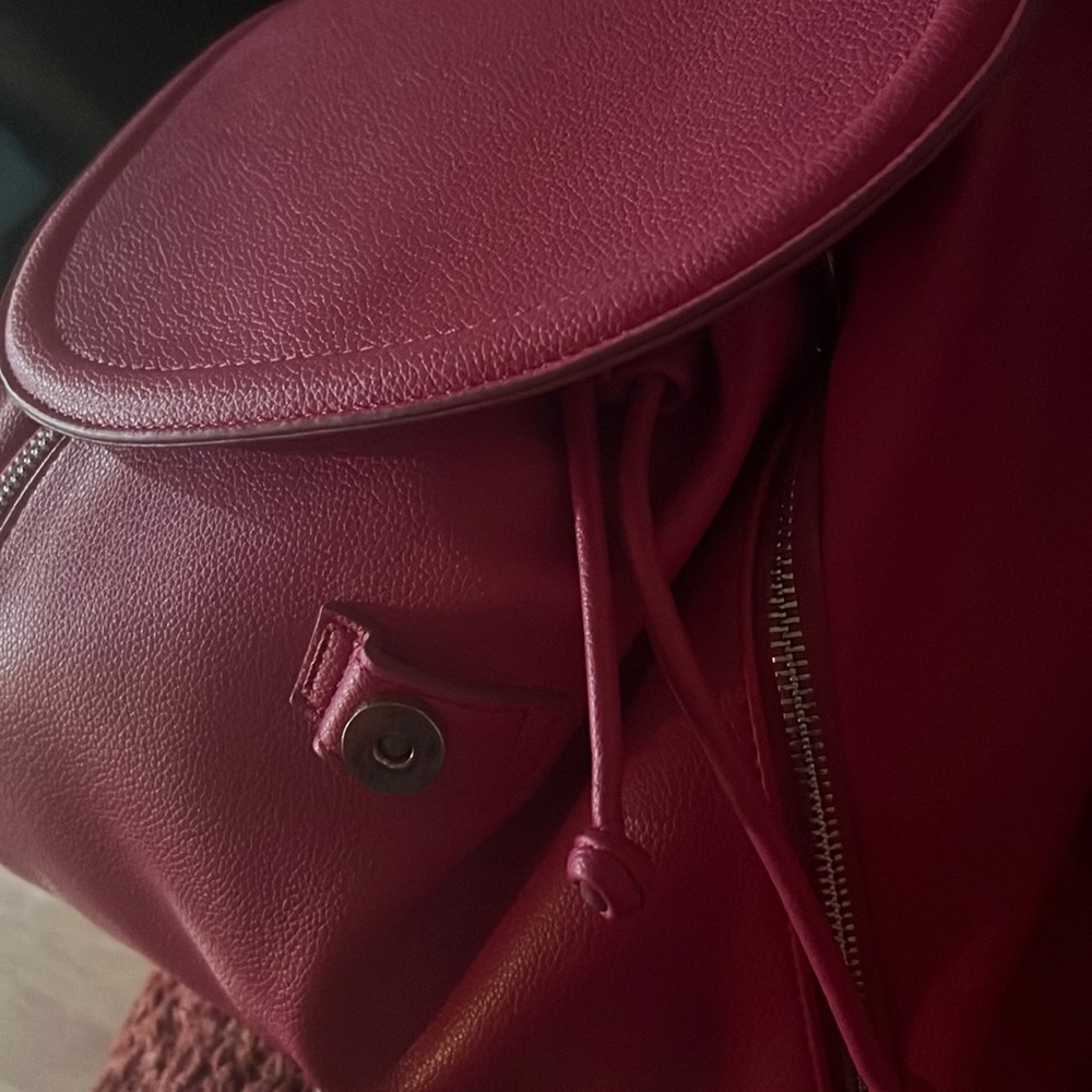 Pink handbag could also be a backpack really nice